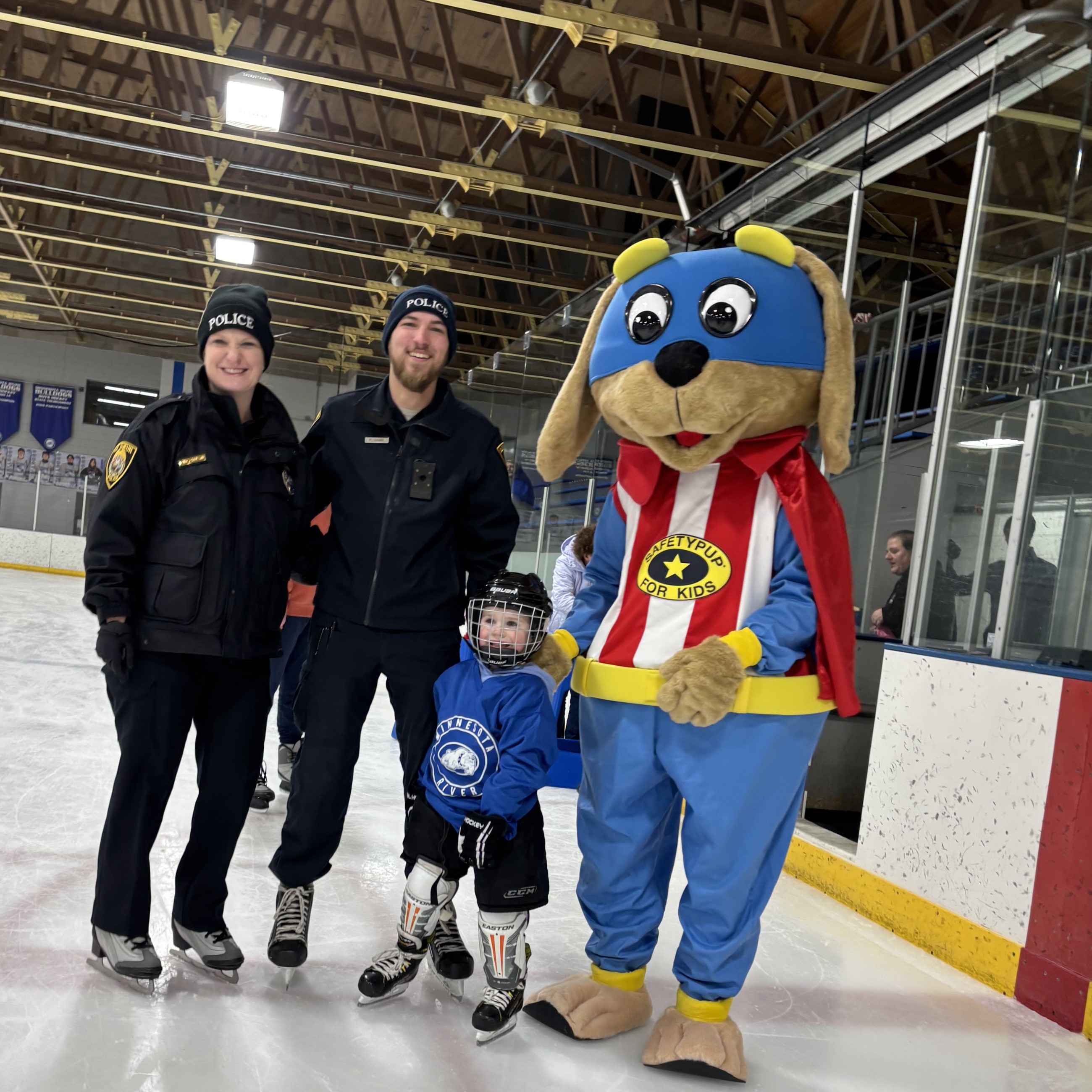Police Officers with Safety Pup and Hockey Player